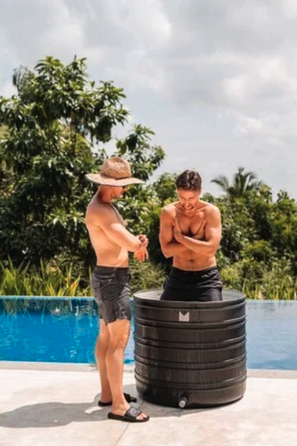 Cold plunge tub beside the pool